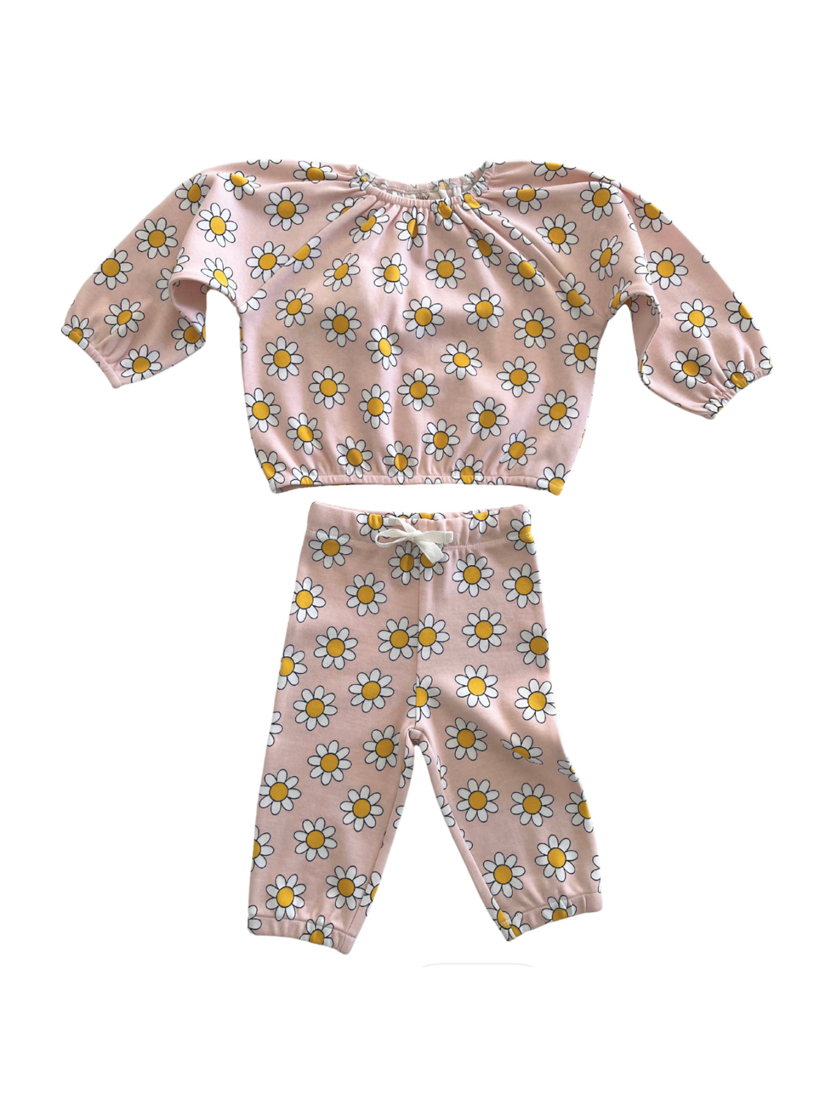 Girls' two-piece outfit featuring a pink floral top and matching pants with daisy print.