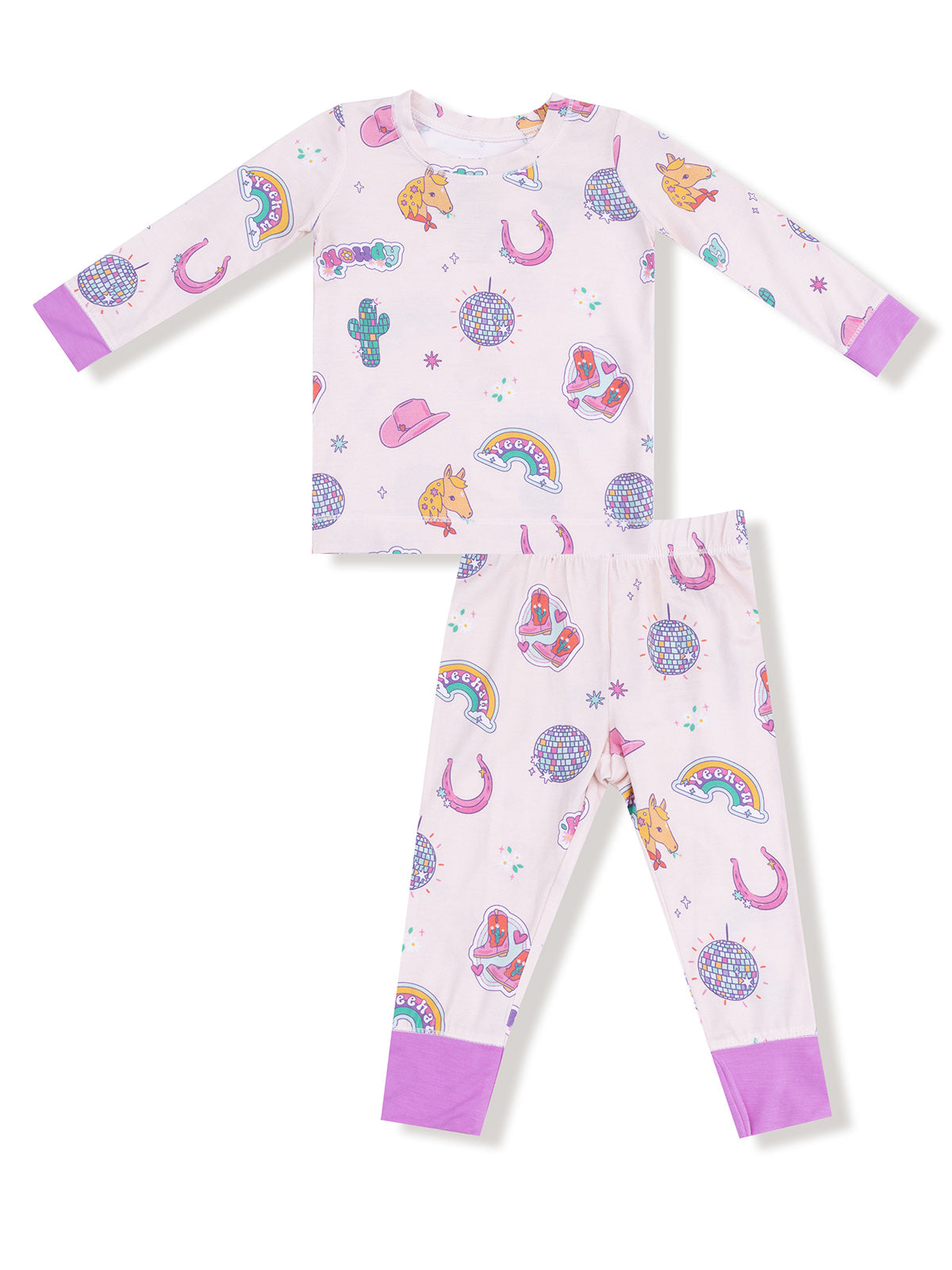 Kids' pajama set featuring playful patterns of cacti, rainbows, and disco balls on a light background.