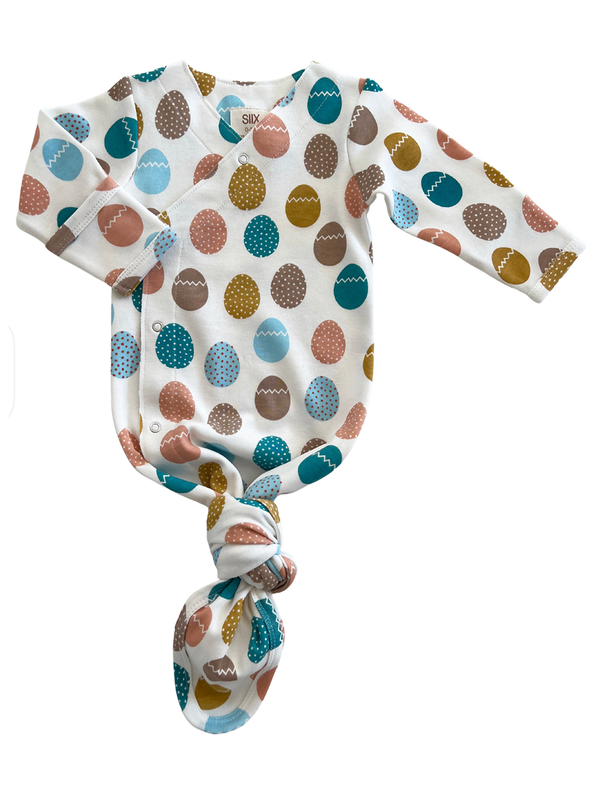 White baby gown with colorful egg patterns, featuring long sleeves and a knotted bottom for easy diaper changes.