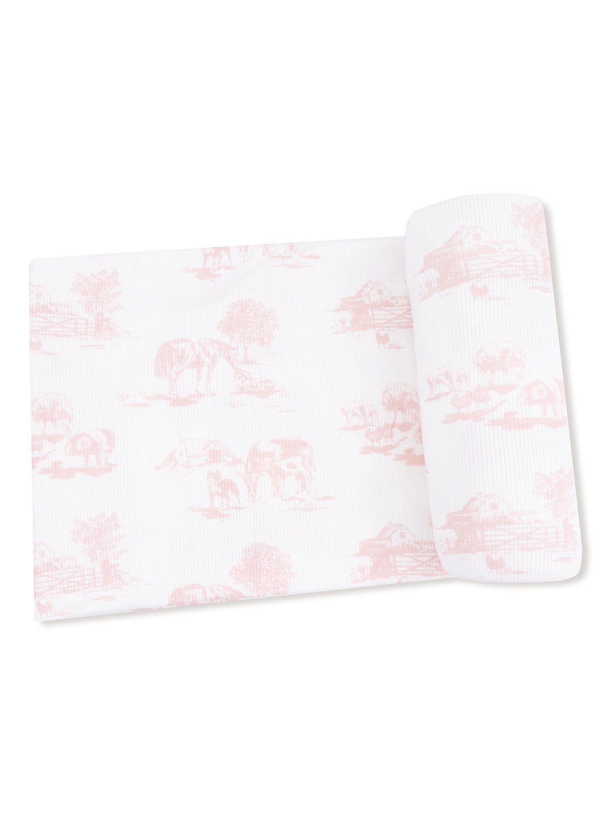 Pink and white patterned fabric featuring farm animal scenes, rolled with a flat section visible.