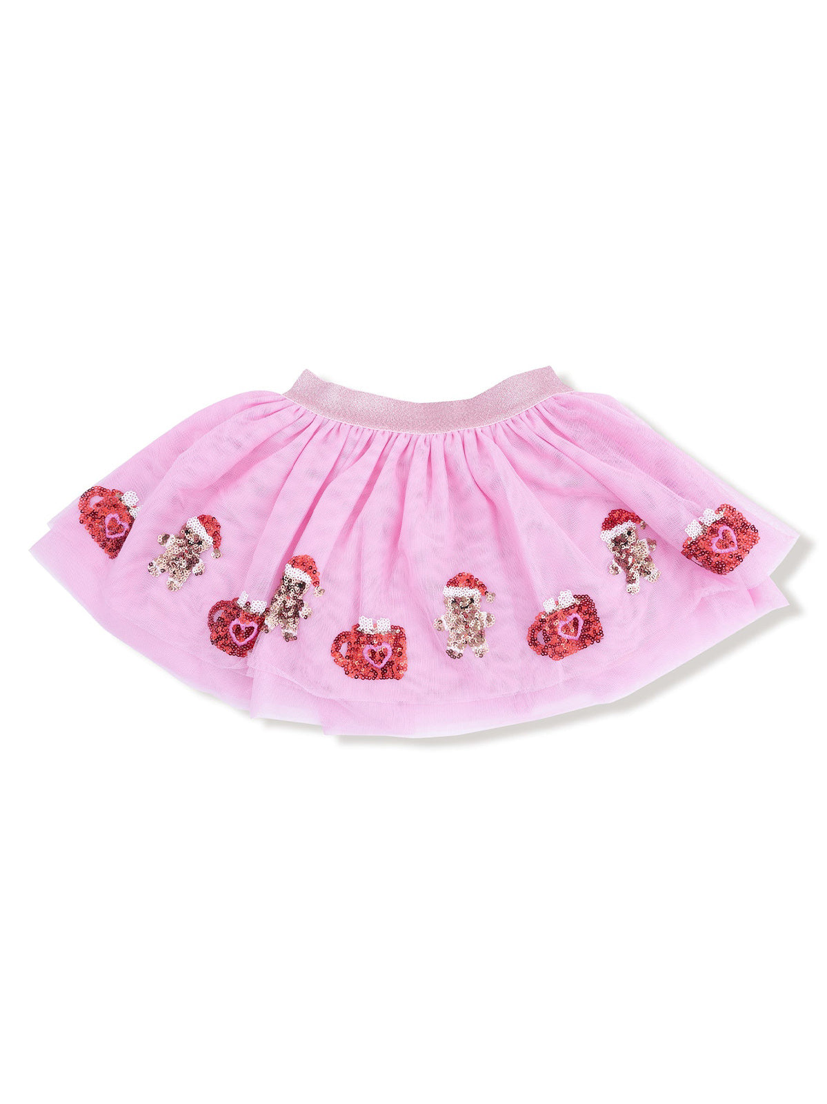 Pink tulle skirt adorned with sequin hearts and gingerbread decorations. Perfect for festive occasions.