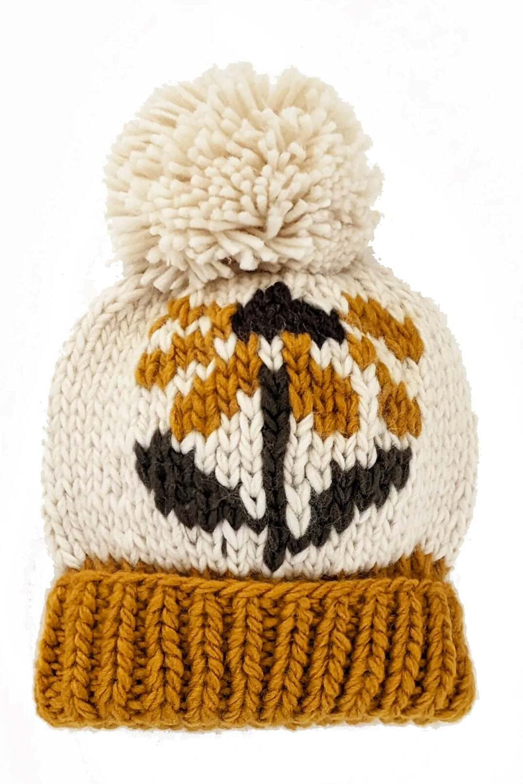 Knitted beanie with a pom-pom, featuring a pumpkin design in orange, white, and black.