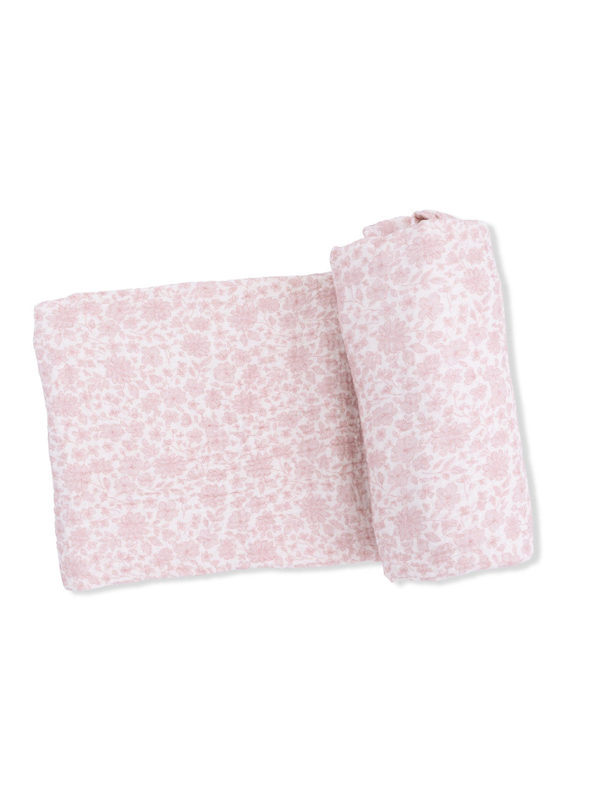 Light pink floral blanket, folded with one rolled end, on a white background. Ideal for cozy or decorative use.