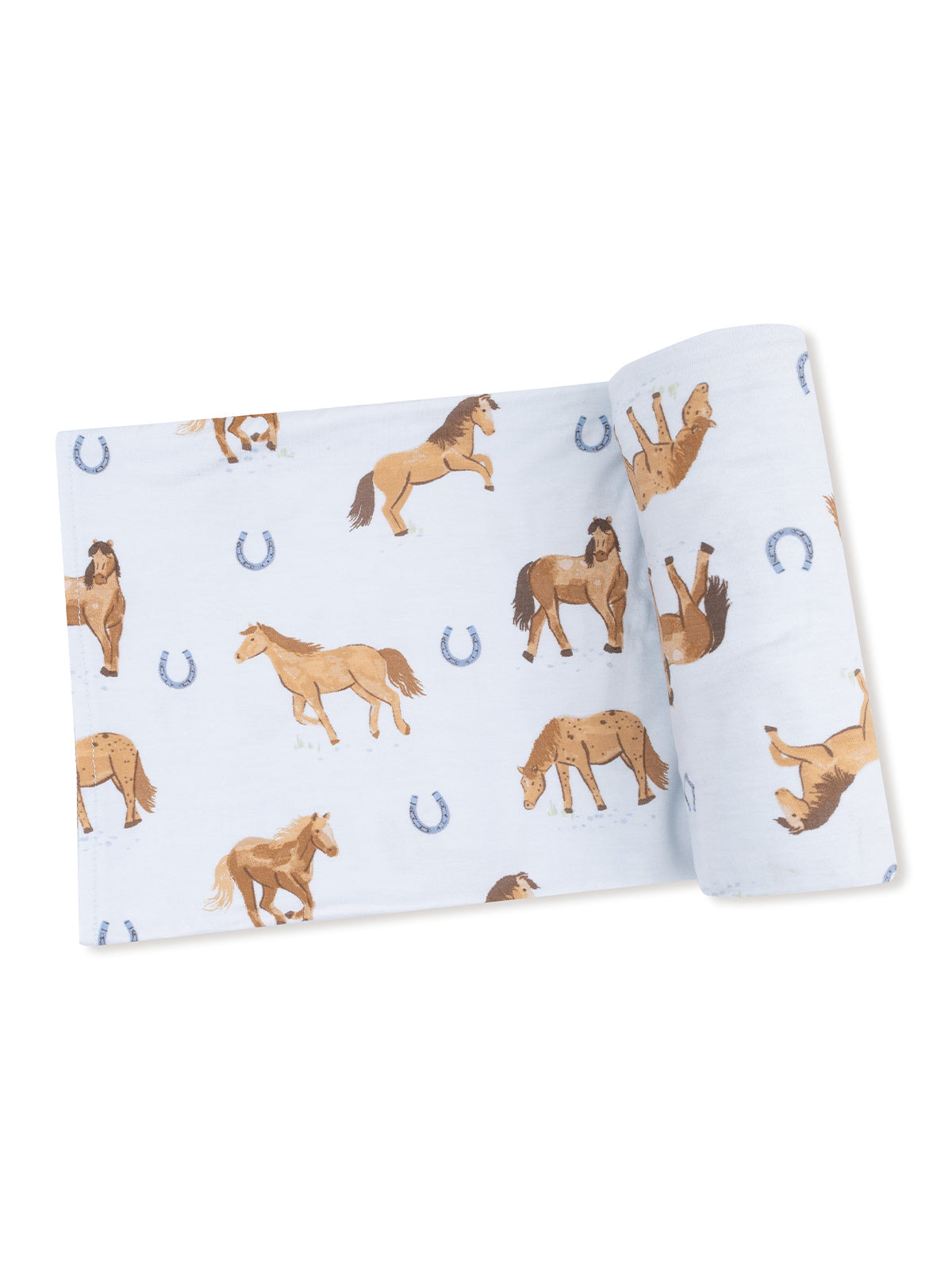 Light blue fabric featuring various illustrated horses and horseshoes in a playful pattern.