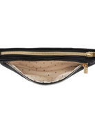 Black zippered clutch with a polka dot interior, showcasing the inner lining and zipper detail.