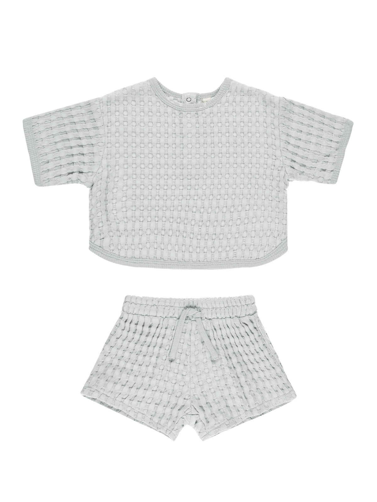 Light gray textured two-piece outfit featuring a short-sleeve top and matching shorts.