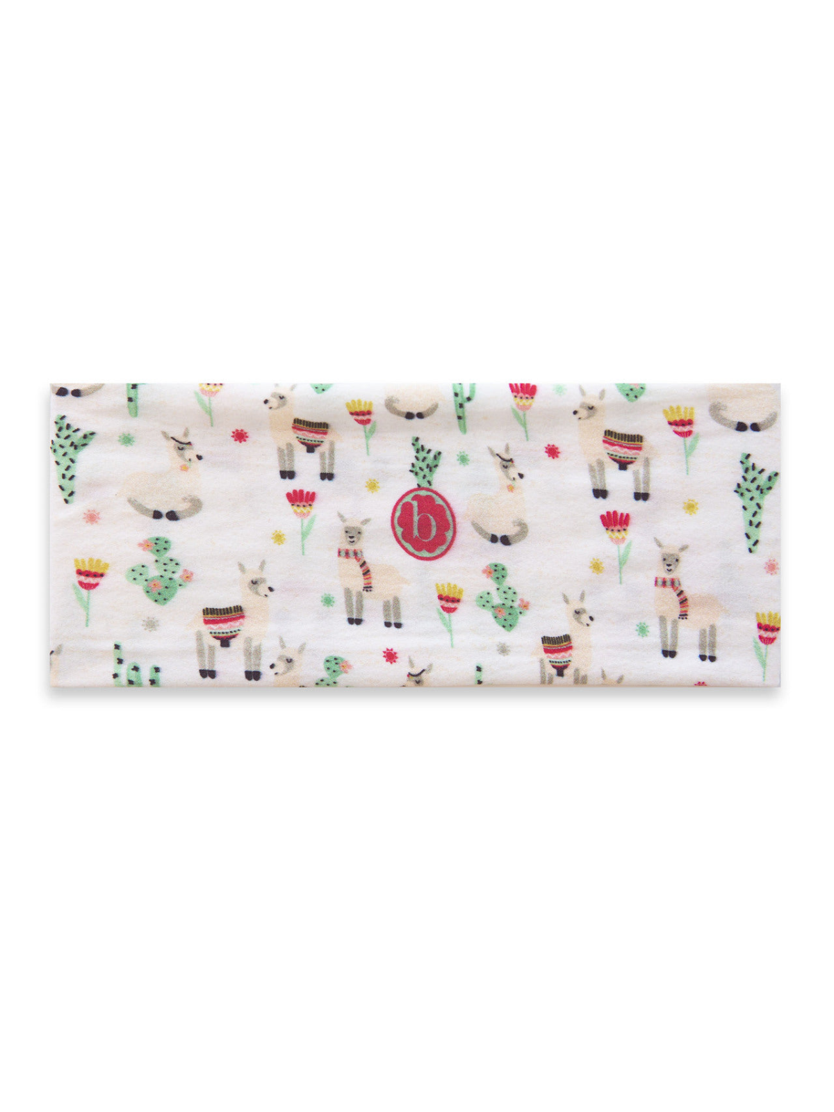 Colorful fabric featuring llamas, cacti, and flowers on a light background, with a circular logo.
