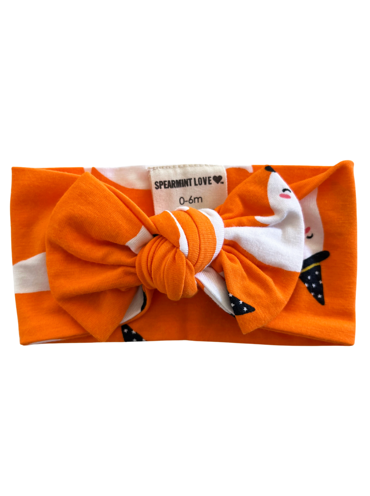 Orange baby headband with a large bow, featuring a playful animal print. Ideal for ages 0-6 months.