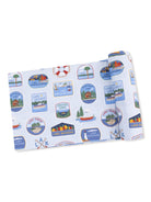 Light blue fabric featuring colorful illustrations of various lakes and their names in decorative labels.