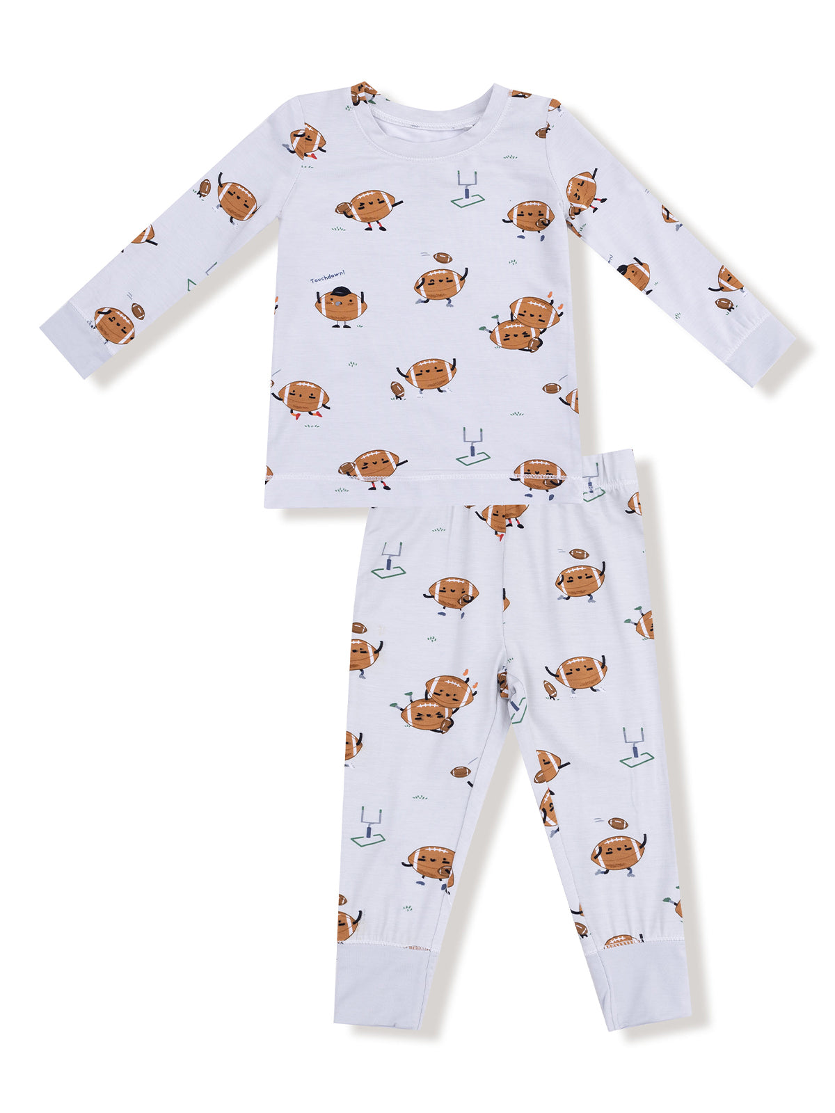 Kids' pajama set featuring playful cartoon football characters on a light background.