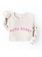 Light beige sweatshirt with "MAMA BUNNY" text in pink, casually laid out on a white background.