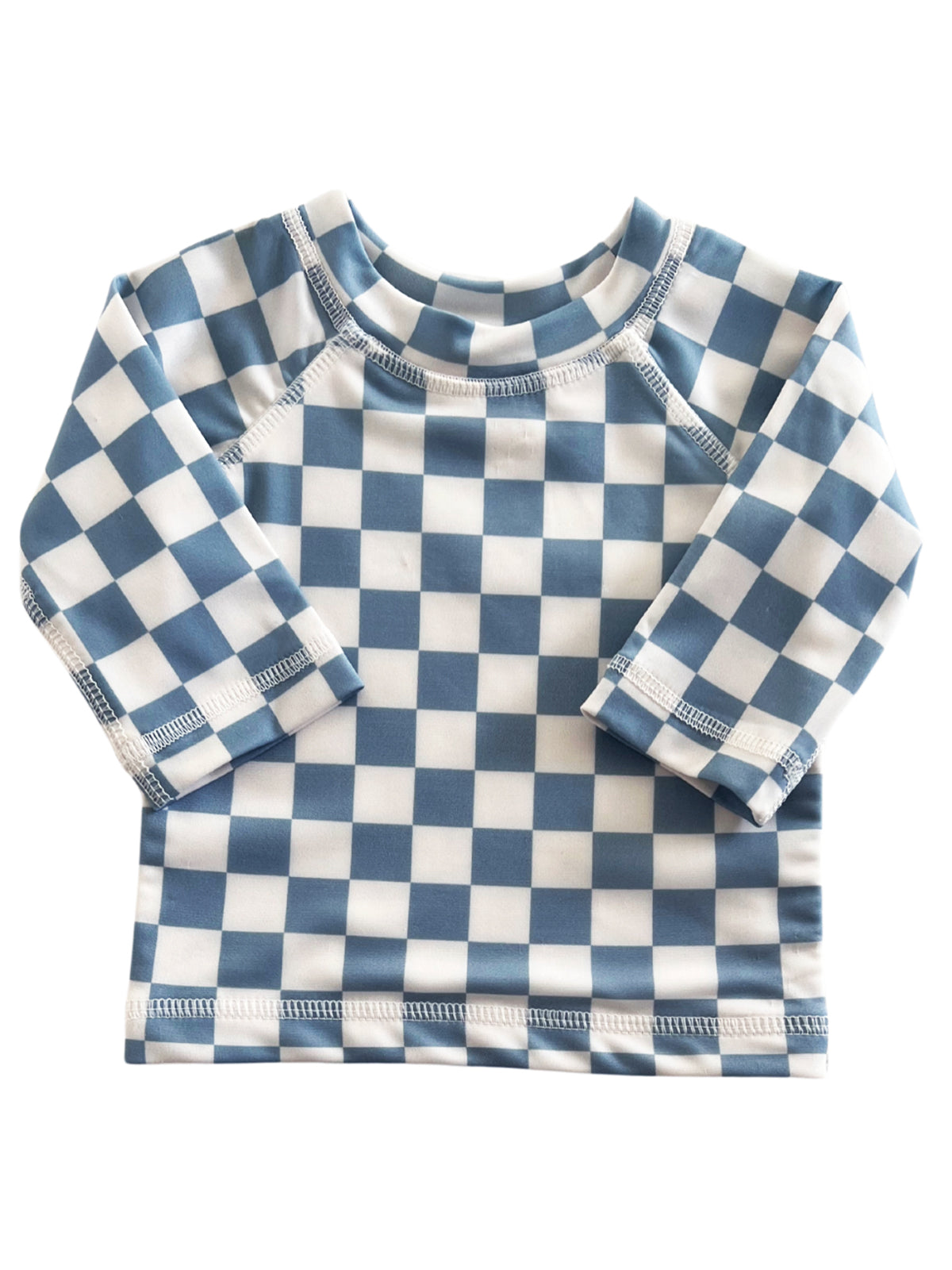 Blue and white checked long-sleeve top for kids, featuring a round neckline and stylish design.