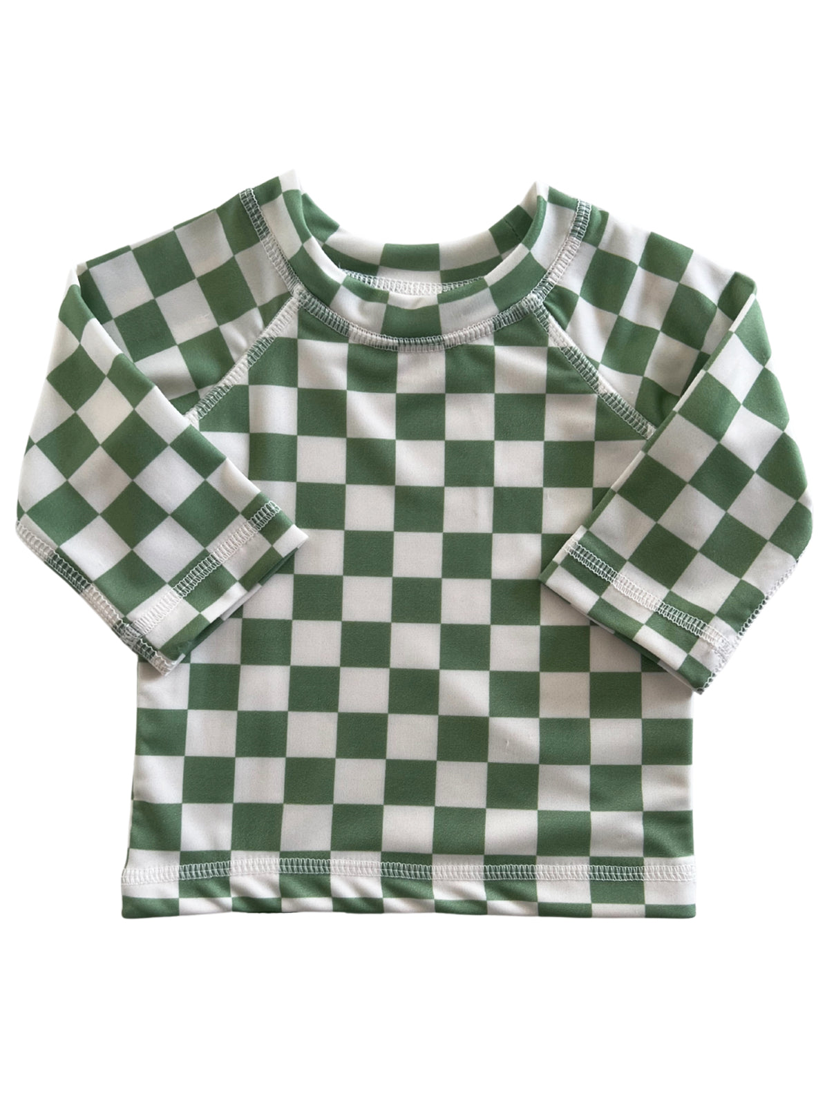 Green and white checkered long-sleeve shirt for children, featuring a round neckline and raglan sleeves.