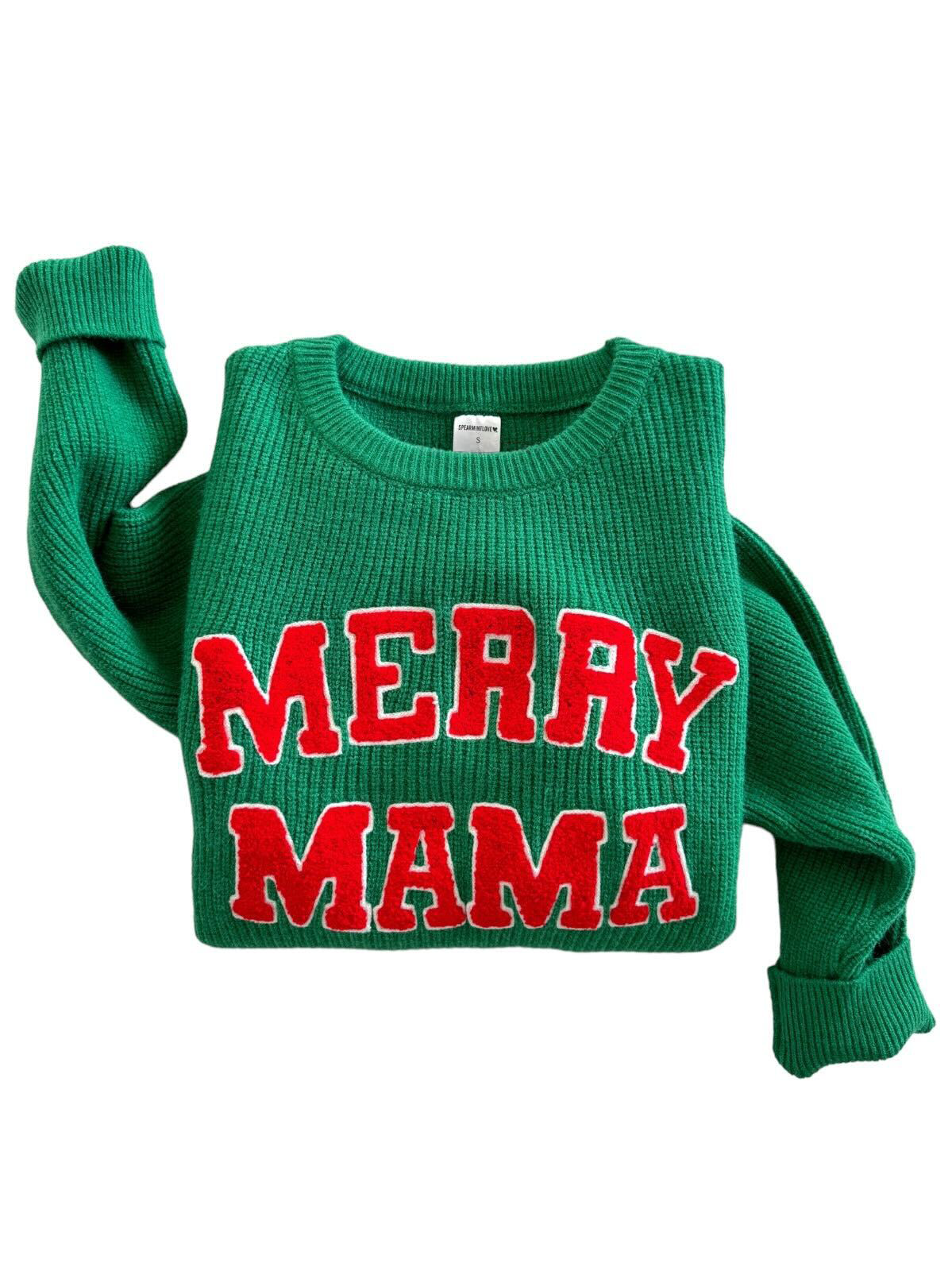 Green sweater with red "MERRY MAMA" text, showcasing a festive holiday style perfect for celebrating.