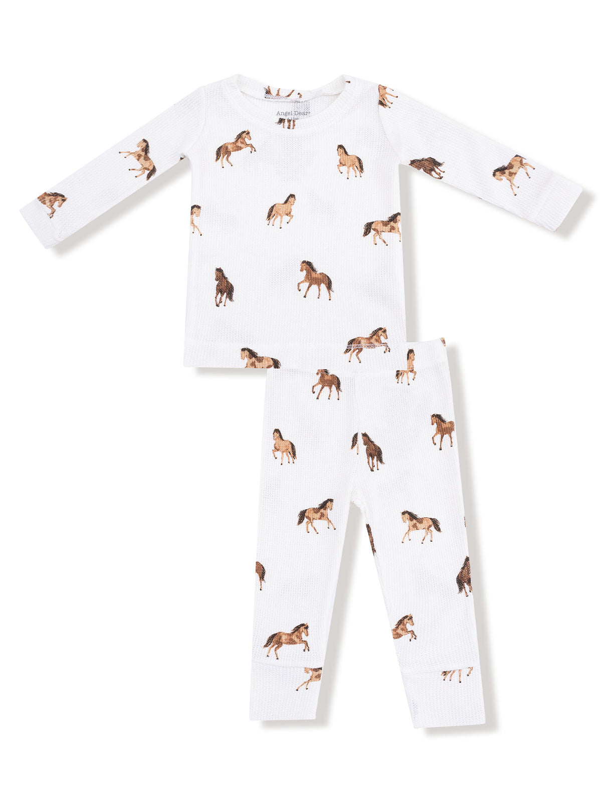 White pajamas set with horse patterns, featuring long sleeves and matching pants. Perfect for kids' sleepwear.