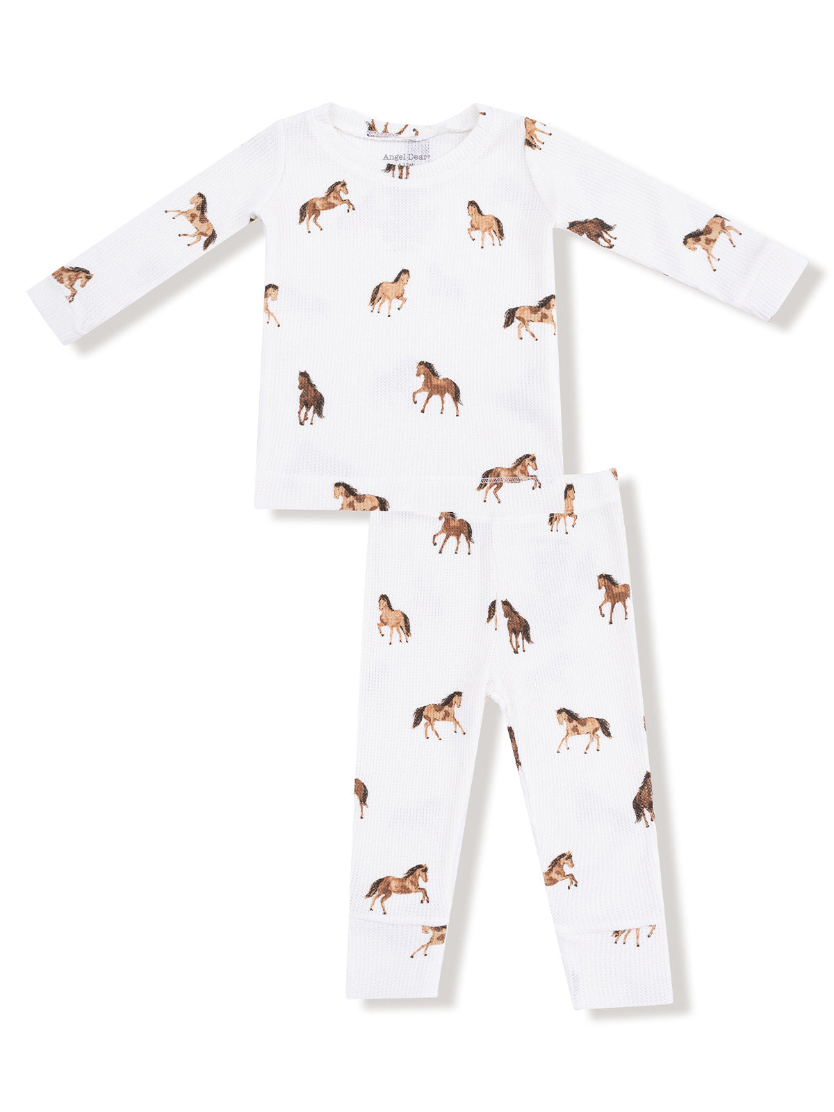 White pajamas set with horse patterns, featuring long sleeves and matching pants. Perfect for kids' sleepwear.