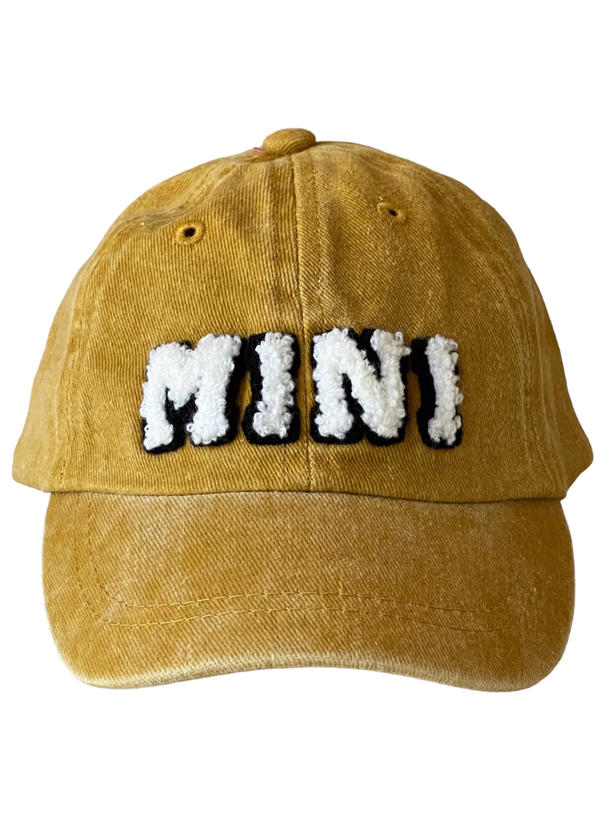 Yellow cap with "MINI" text in fluffy white and black letters on the front.