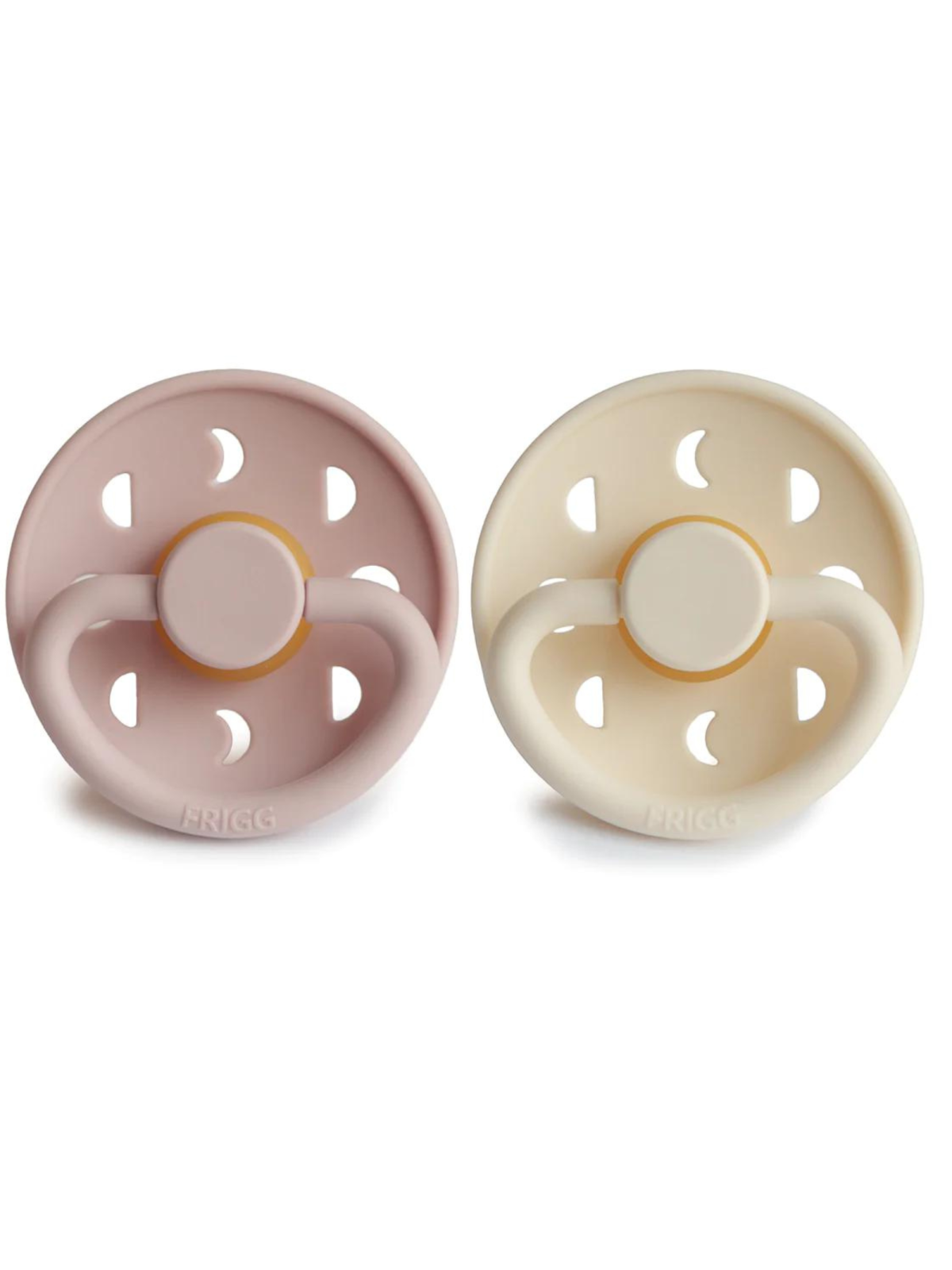 Two silicone pacifiers in light pink and beige, featuring a round shield and a central knob for easy handling.