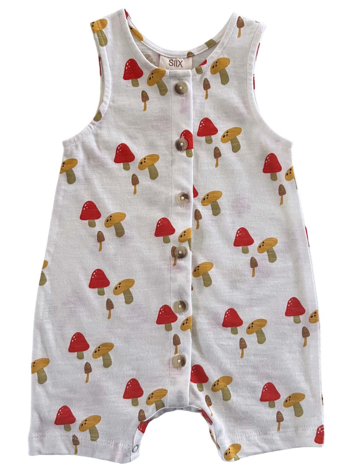 White romper with colorful mushroom patterns and front buttons. Ideal for baby or toddler fashion.