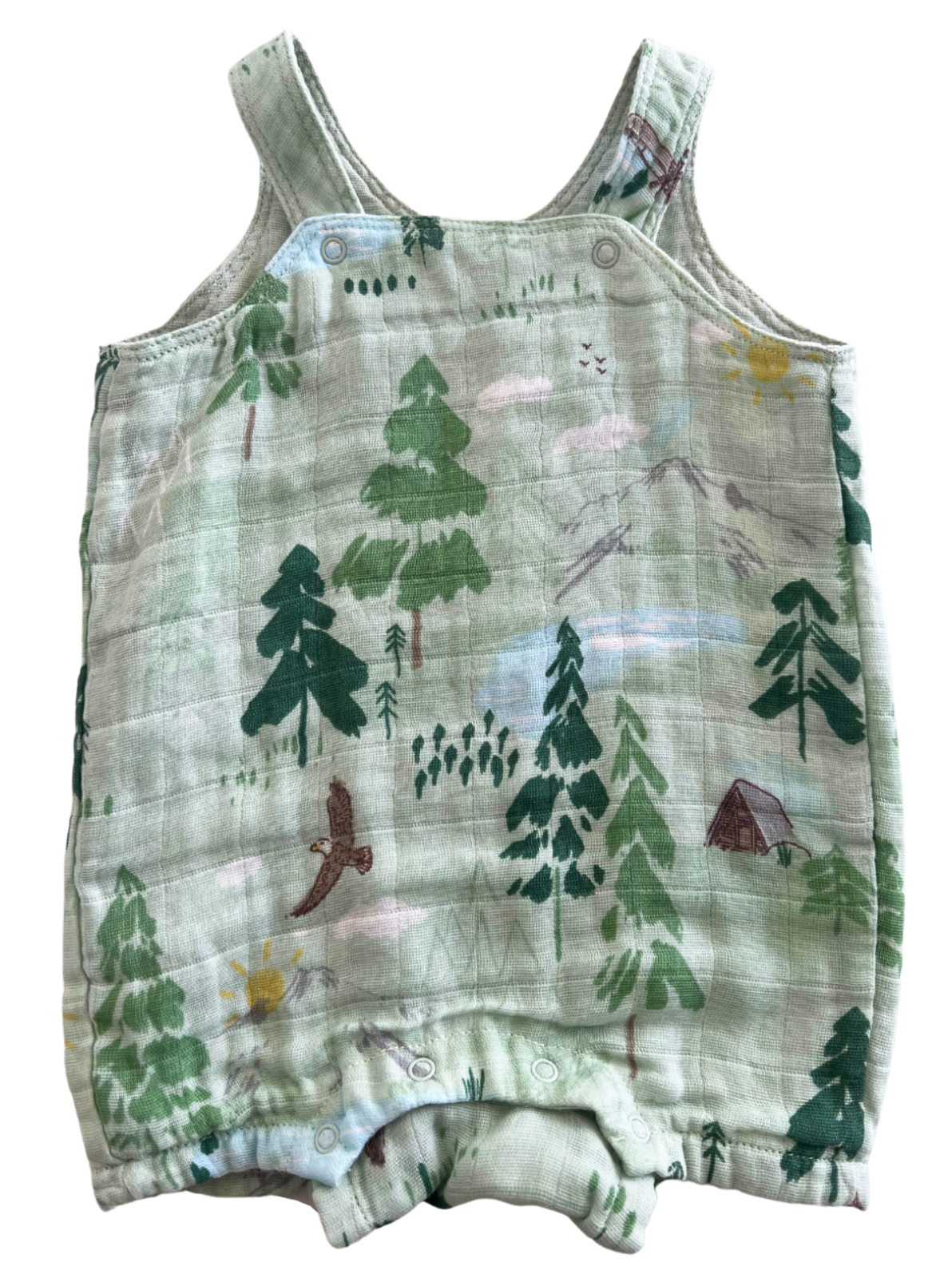 Green toddler romper featuring a nature print with trees, birds, and a tent design. Ideal for outdoor adventures.