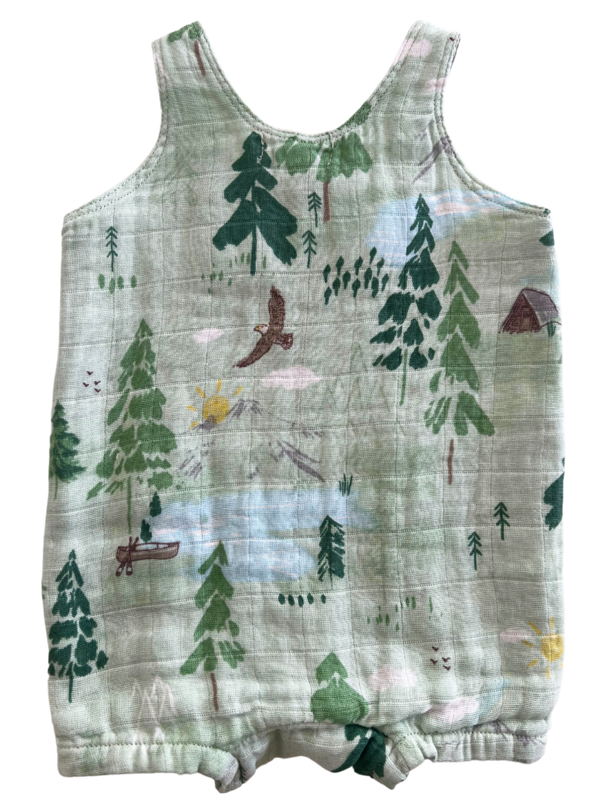 Green sleeveless romper featuring a nature print with trees, animals, and scenic elements. Ideal for children.