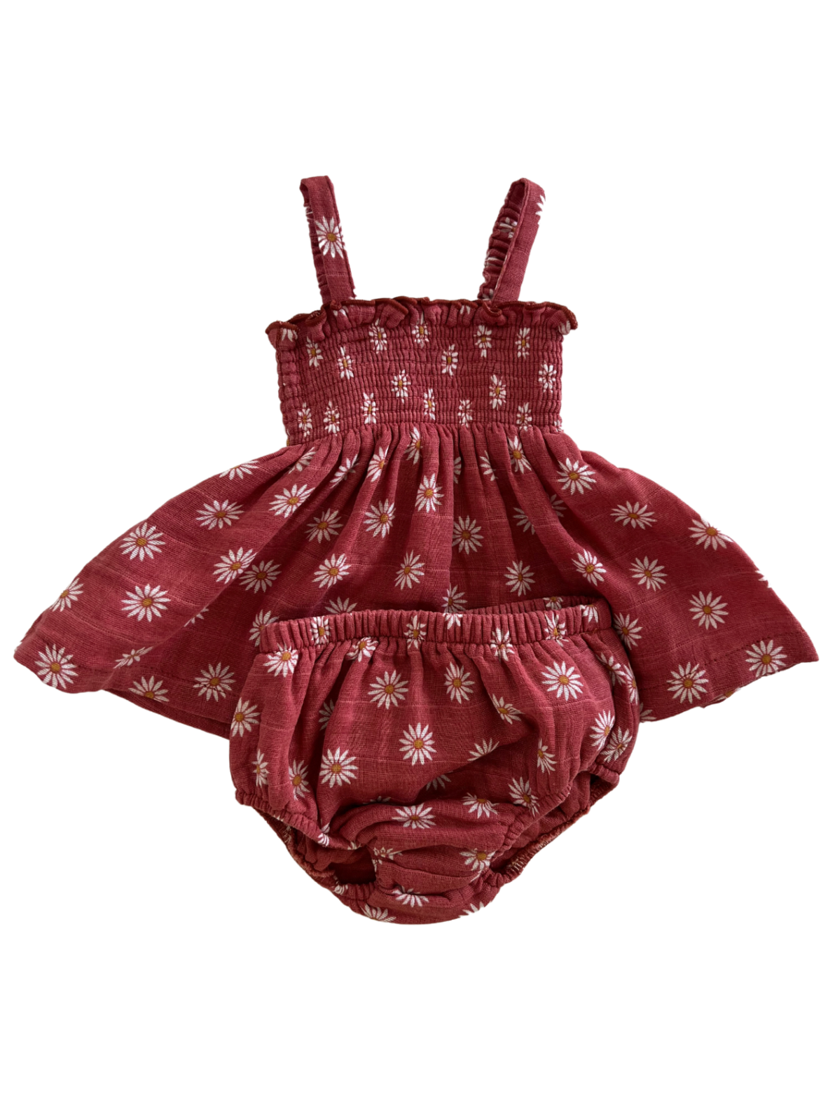 Red floral baby dress with matching bloomer. Features thin straps and a smocked bodice design.