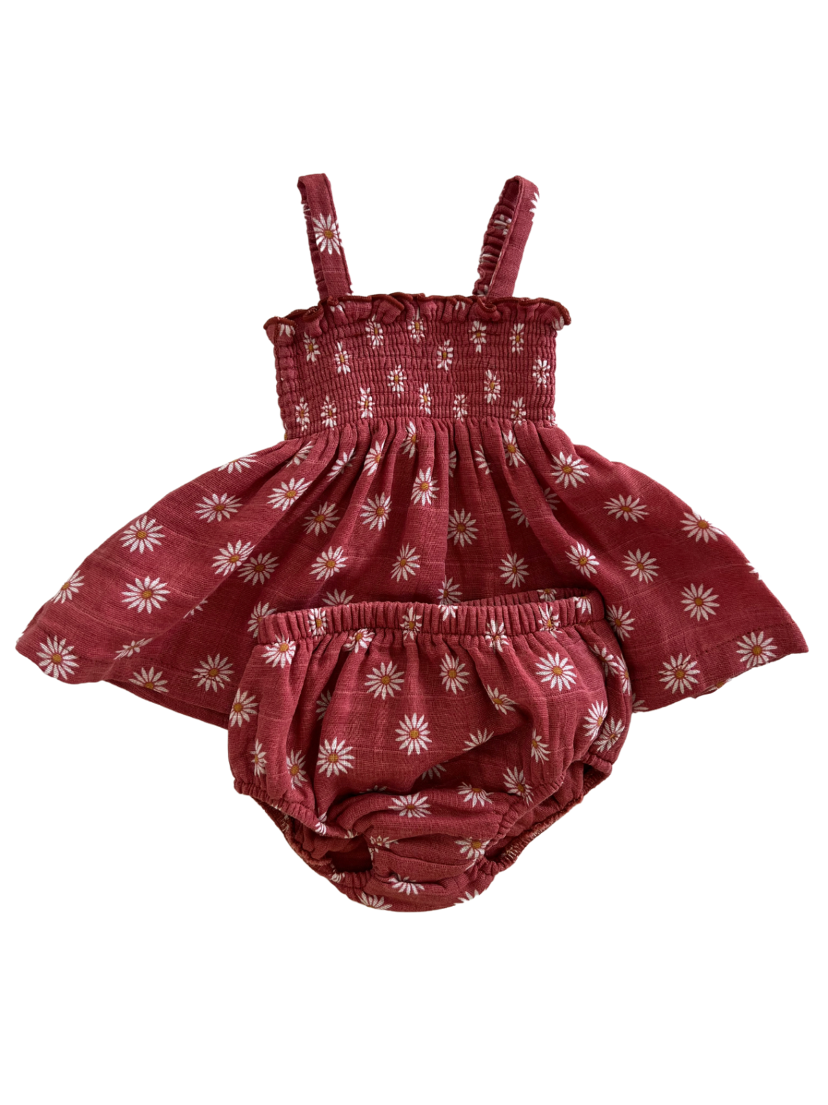 Red floral baby dress with matching bloomer. Features thin straps and a smocked bodice design.