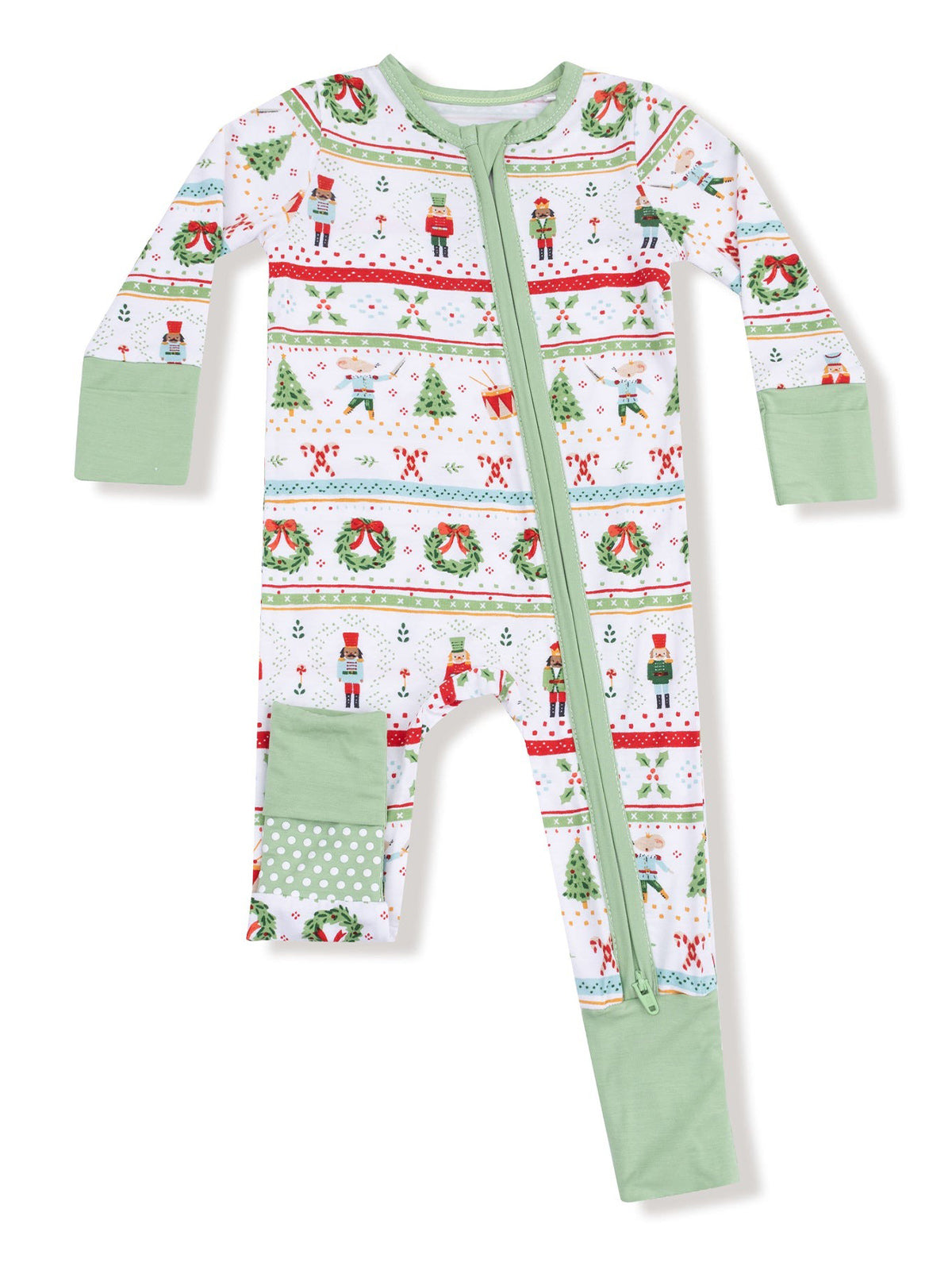 Holiday-themed baby onesie featuring festive prints of nutcrackers and Christmas trees in vibrant colors.