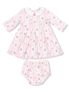 Pink floral dress with white collar and matching bloomers, perfect for little girls' special occasions.