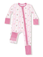 Pink floral onesie with a front zipper and polka dot pocket, ideal for infants and toddlers.