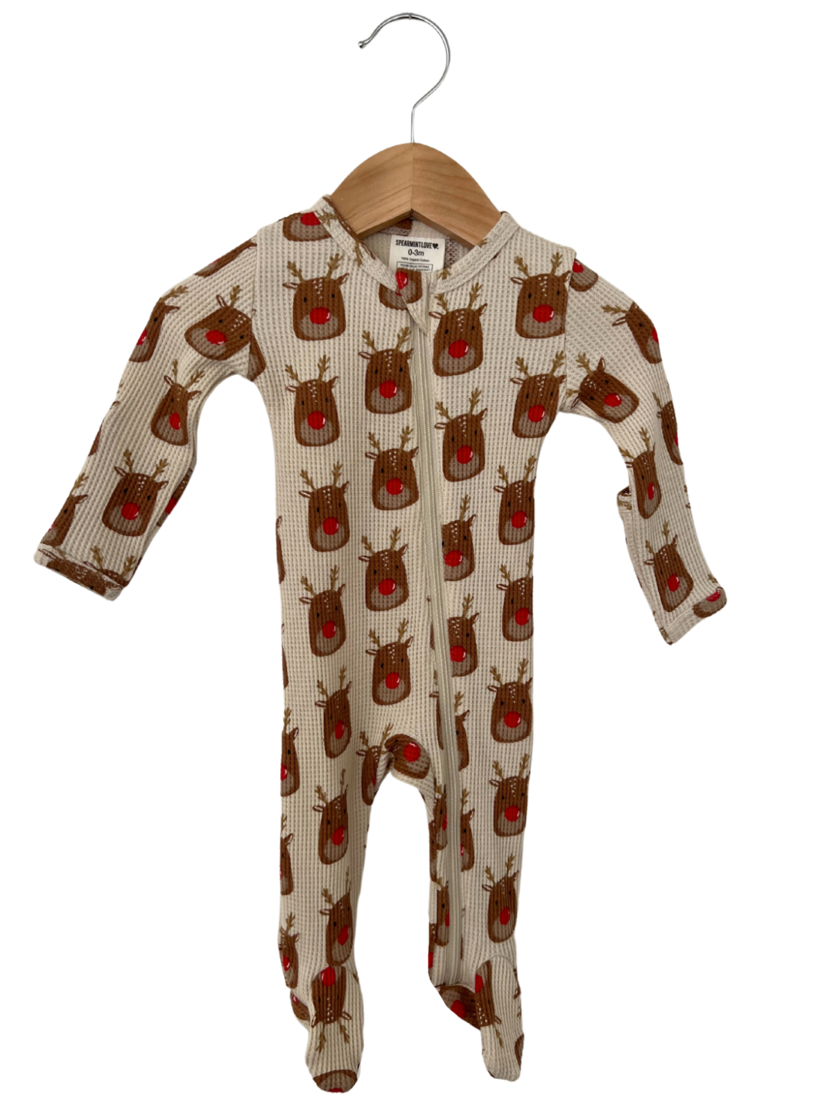 Beige infant onesie with reindeer print, featuring red noses and antlers, hanging on a wooden hanger.