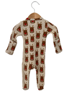 Baby onesie with reindeer print, featuring a soft fabric and long sleeves, hanging on a wooden hanger.