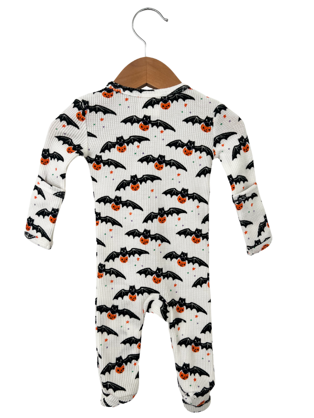 White onesie with bat and pumpkin pattern, perfect for Halloween outfits for infants and toddlers.