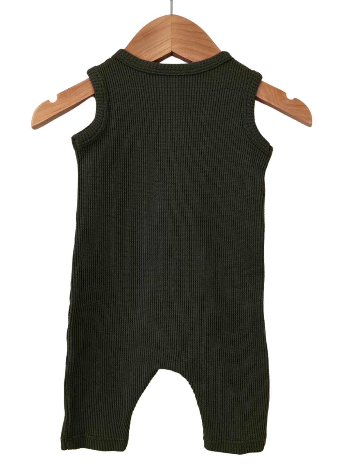 Green ribbed sleeveless onesie hanging on a wooden hanger against a white background.