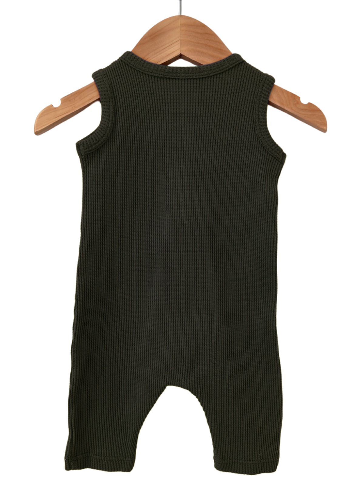 Green ribbed sleeveless onesie hanging on a wooden hanger against a white background.