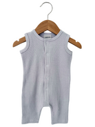 Light gray cotton baby romper on a wooden hanger, featuring a button-up front and sleeveless design.