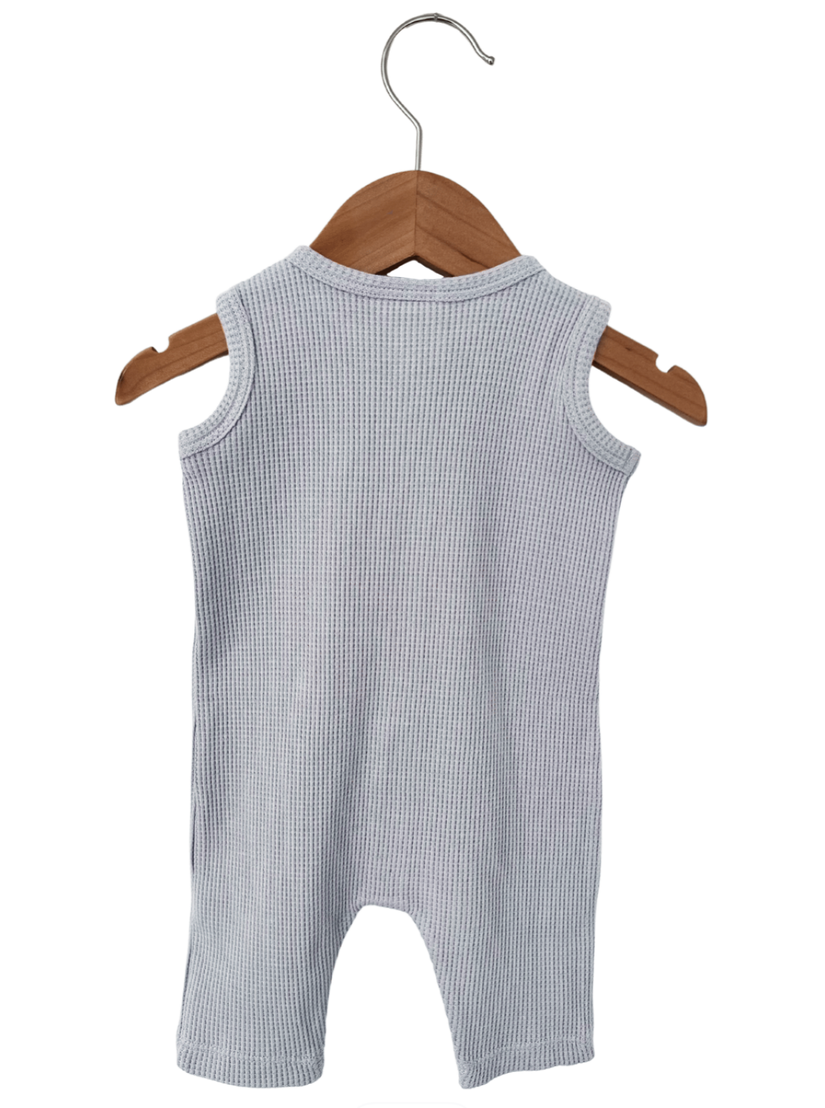 Light gray sleeveless onesie hanging on a wooden hanger against a white background.