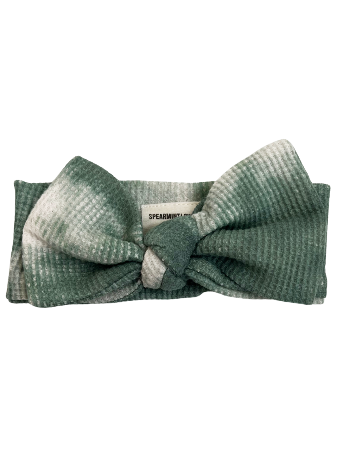 Green textured headband with a large knot detail at the front. Brand label: Spearmint.