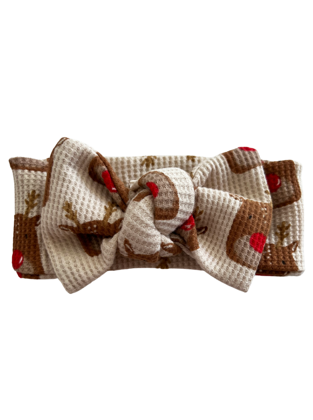 Reindeer-patterned hair bow with a cute knot, perfect for holiday outfits.