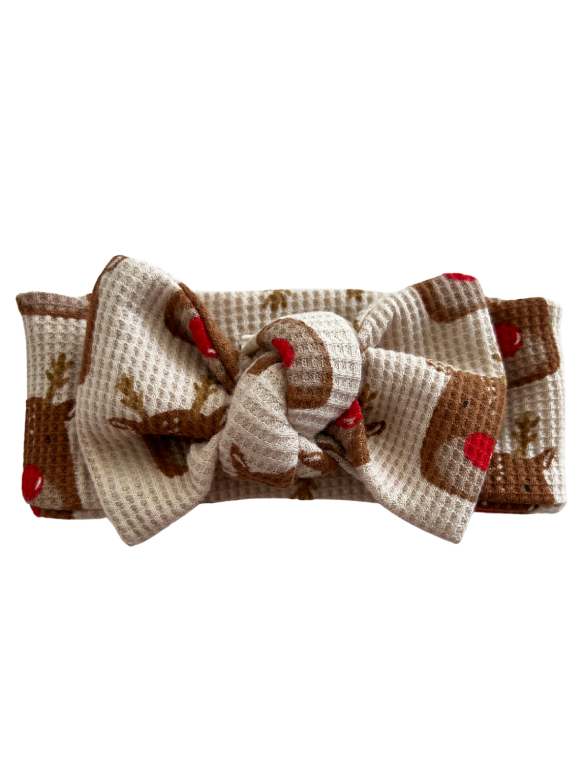Reindeer-patterned hair bow with a cute knot, perfect for holiday outfits.