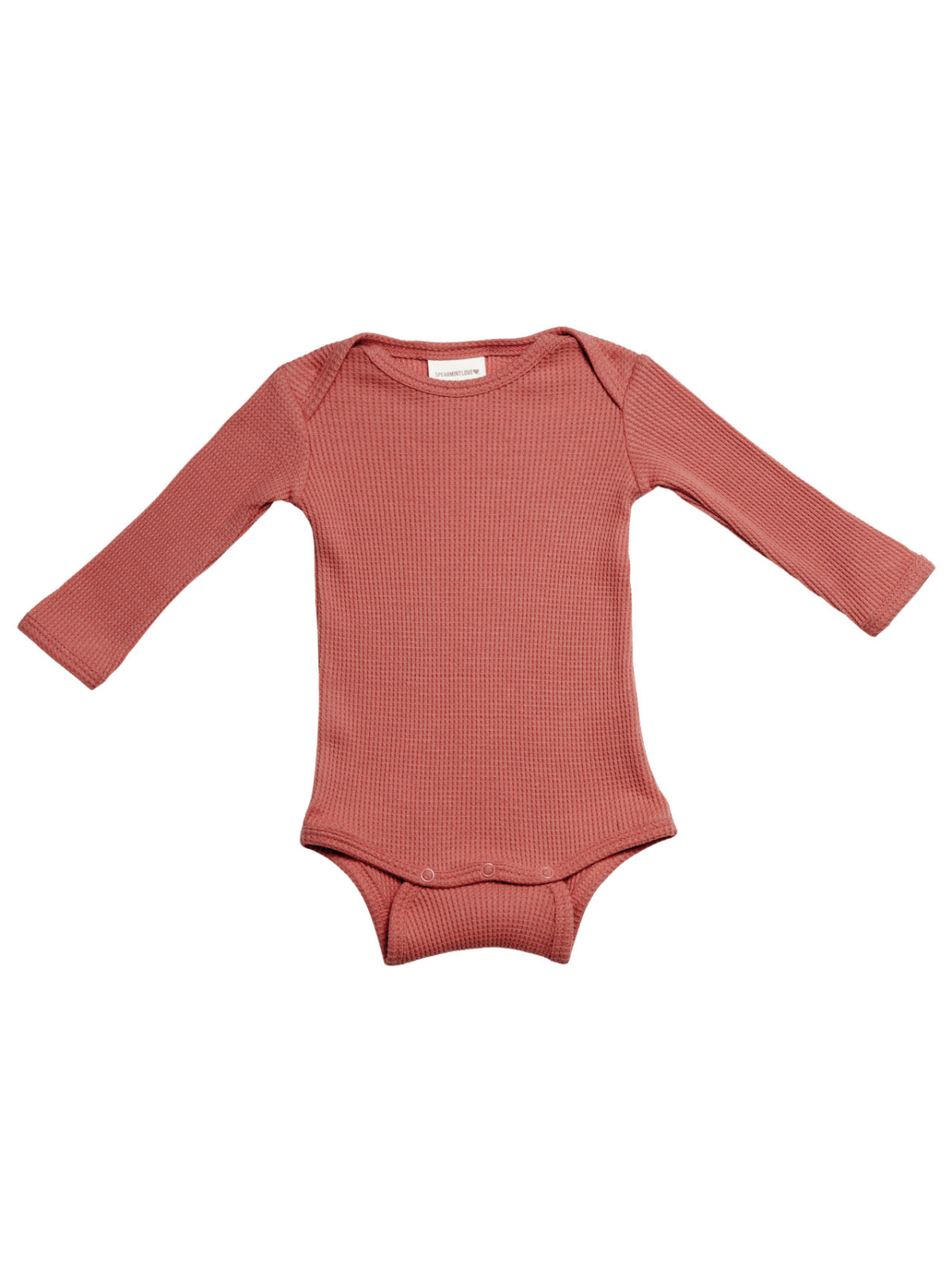 Rust ribbed long-sleeve onesie for infants with snap closures at the bottom.