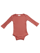 Rust ribbed long-sleeve onesie for infants with snap closures at the bottom.