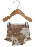 Brown and beige tie-dye shorts with ruffled edges displayed on a wooden hanger against a white background.