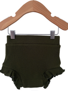 Olive green ribbed baby bloomer shorts with ruffled edges, displayed on a wooden hanger.