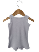 Gray sleeveless shirt hanging on wood hanger against a white background.