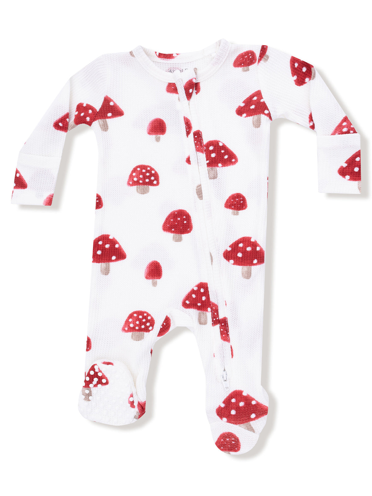 White baby onesie featuring red mushroom prints and a front zipper. Ideal for snug comfort and playful style.