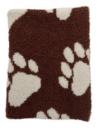 Brown and cream patterned blanket with paw prints on a soft texture. Ideal for pet lovers.