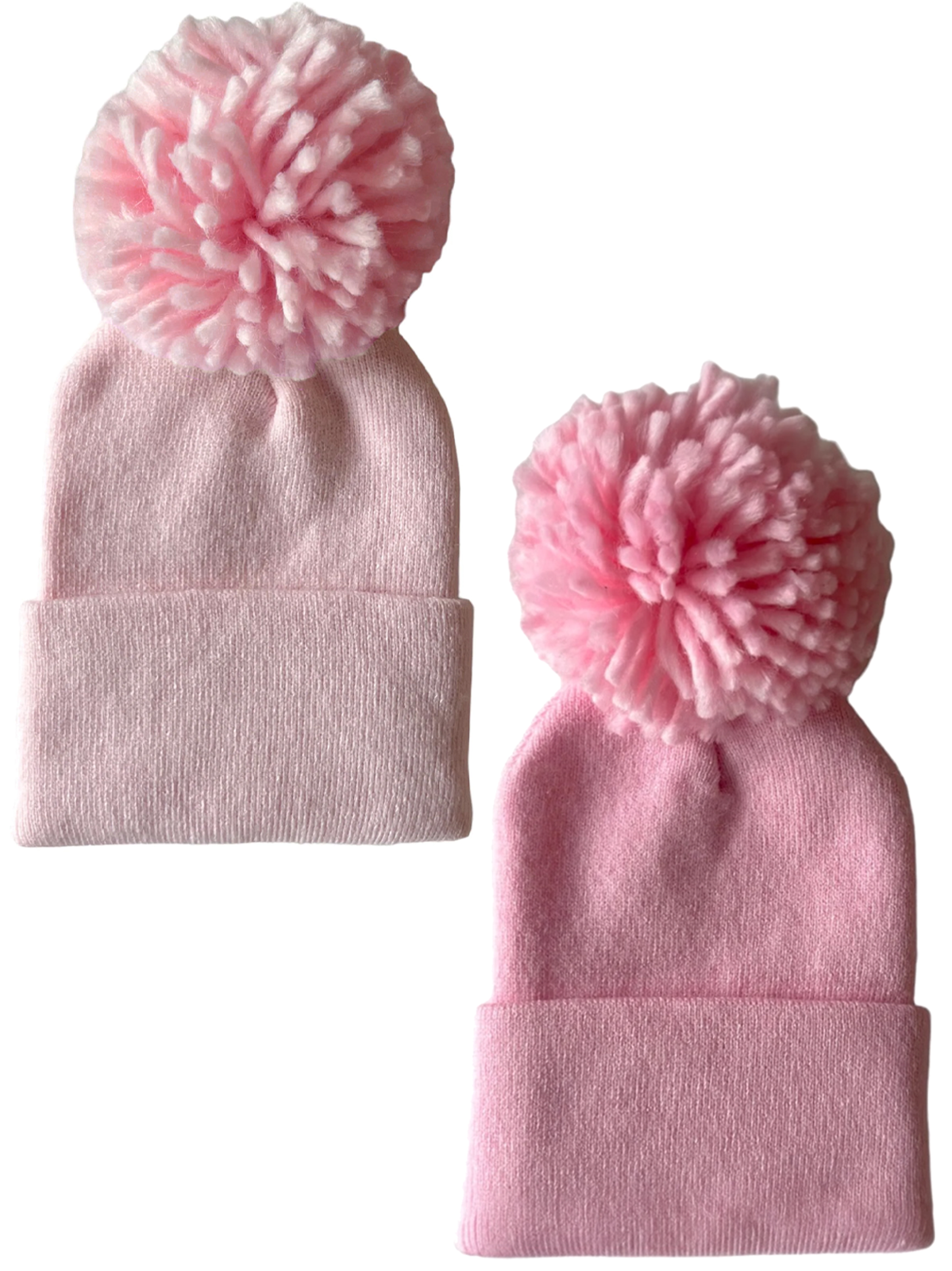 Two pink knitted beanies with large pom-poms on top, displayed side by side.