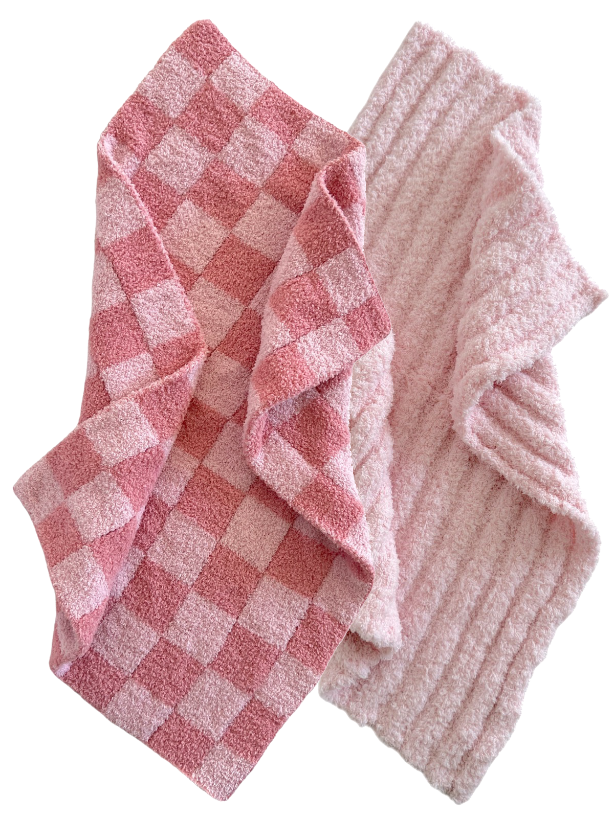 Two pink textured towels, one in a checkered pattern and the other with a ribbed design, overlapping on a white background.