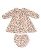 Floral print baby dress with matching bloomers, featuring long sleeves and a ruffled neckline.